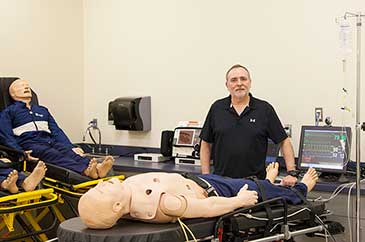 Dave in the paramedic lab at City College
