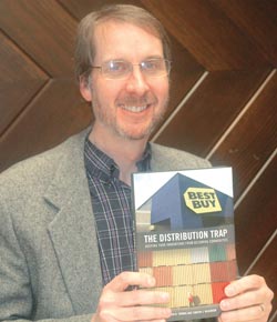 Dr. Tim Wilkinson with his new book, Don't Fall into the Distribution Trap
