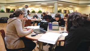 students studying in Jacket Student Central at the COT