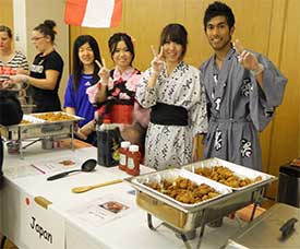 International students serving Japanese food at the 2012 International Food Fair