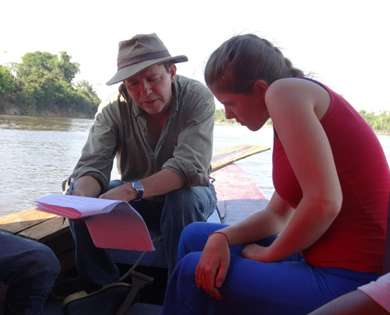 Juan Carlos with a student on the Amazon River