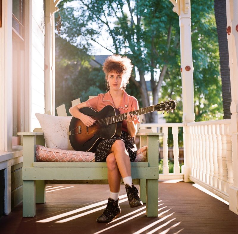 Molly Reeves playing guitar