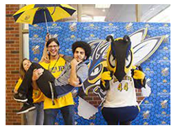 MSUB students with mascot "Buzz"