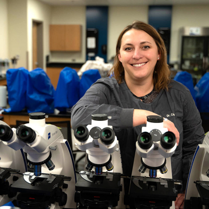 Madison Collins with lab equipment