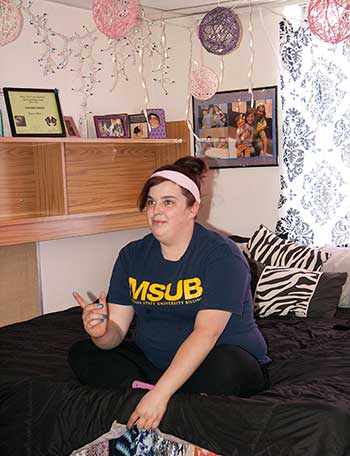 MSUB student in her well-decorated residence hall room