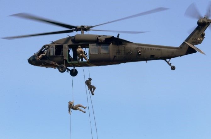 cadets repelling from a black hawk helicoptor