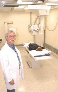 Mick Ender with new radiology equipment at the MSU Billings COT