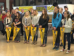 high school students holding their MSUB pennants